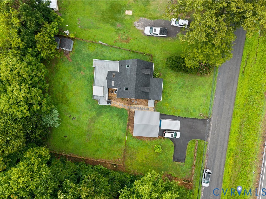 Aerial perspective showcasing a property with exte