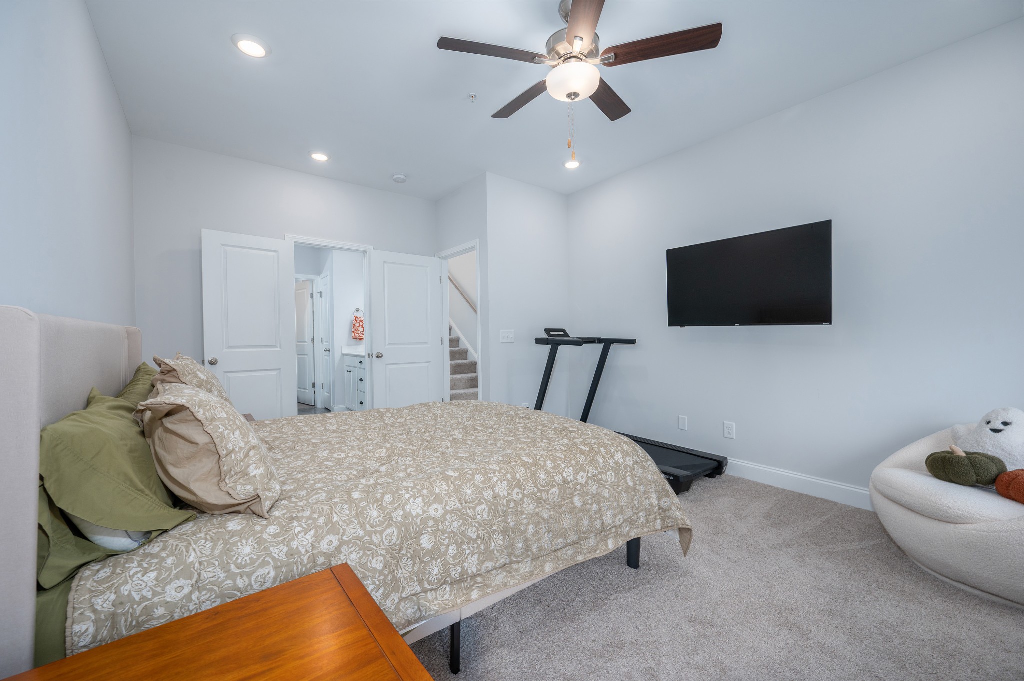 1060 June Wilde Ridge Spring Hill, TN 37174 - Photo 13 of 43 a bedroom with a bed and a flat screen tv