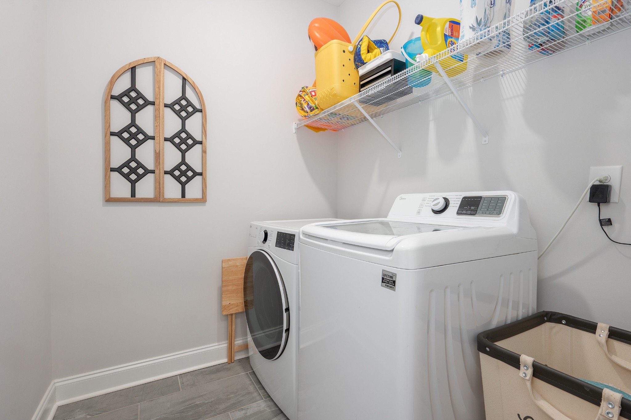 1060 June Wilde Ridge Spring Hill, TN 37174 - Photo 17 of 43 a utility room with dryer and washer