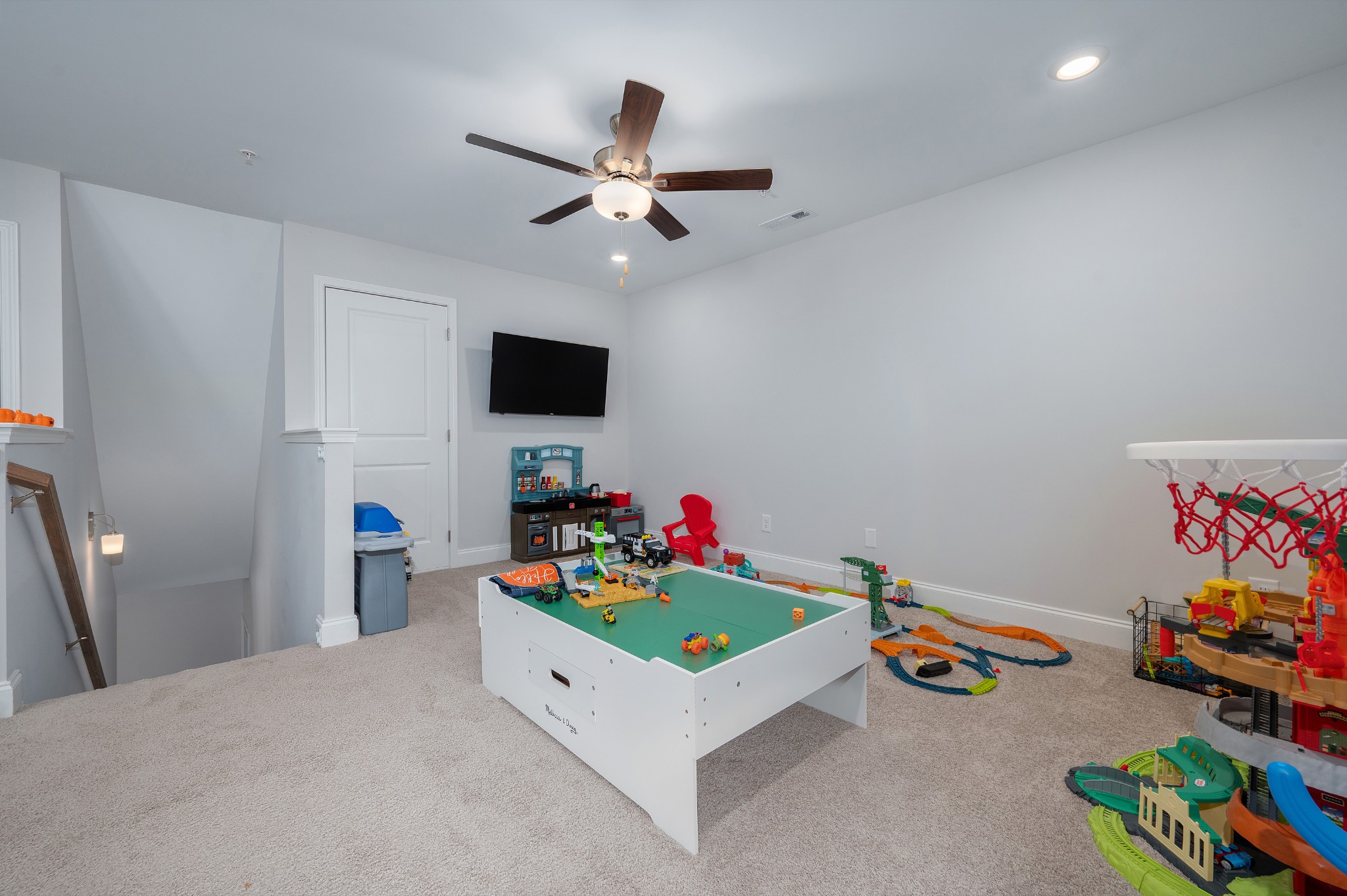 1060 June Wilde Ridge Spring Hill, TN 37174 - Photo 18 of 43 a room with toys and a wooden floor