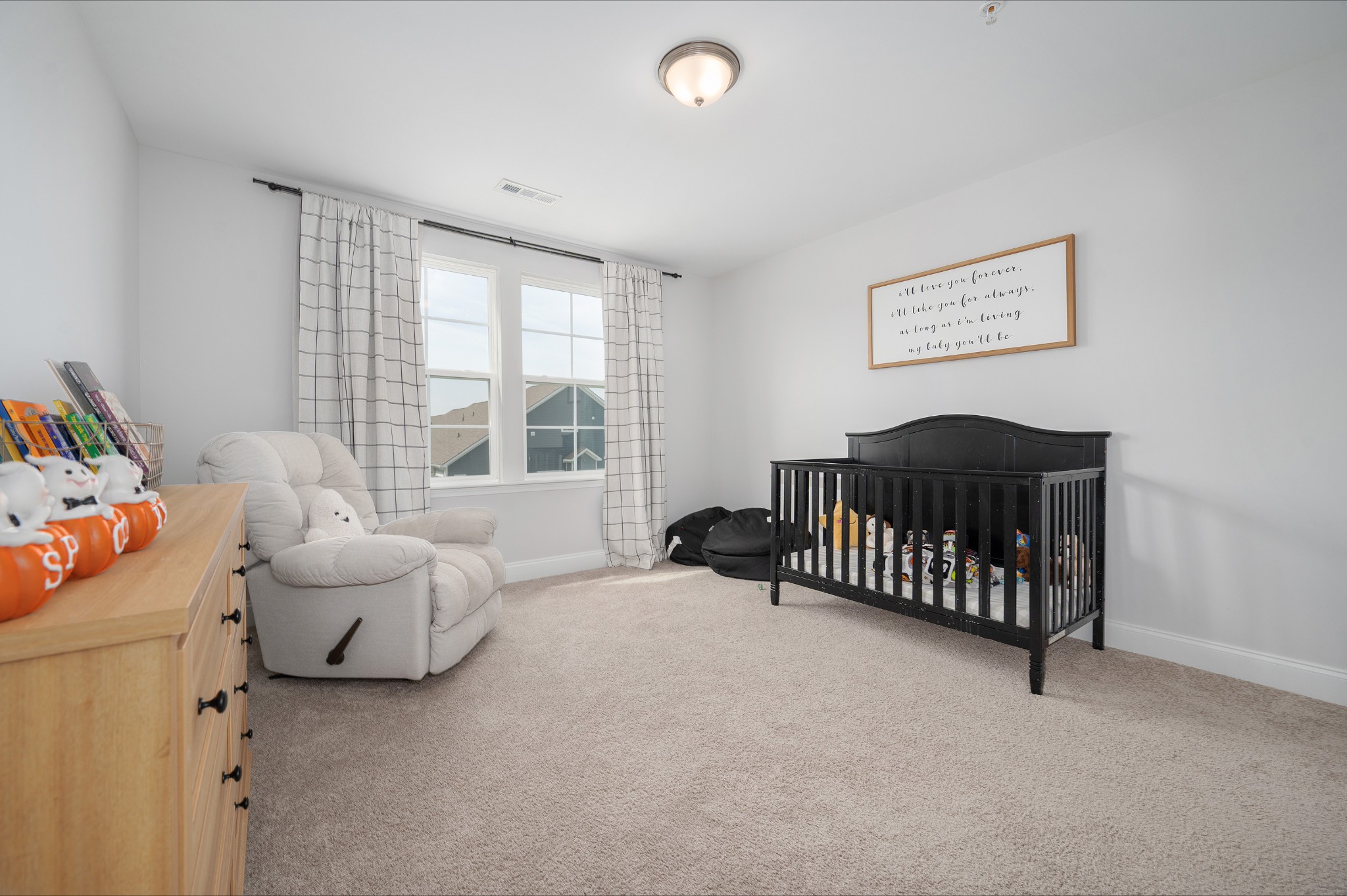 1060 June Wilde Ridge Spring Hill, TN 37174 - Photo 20 of 43 a bedroom with furniture and a large window