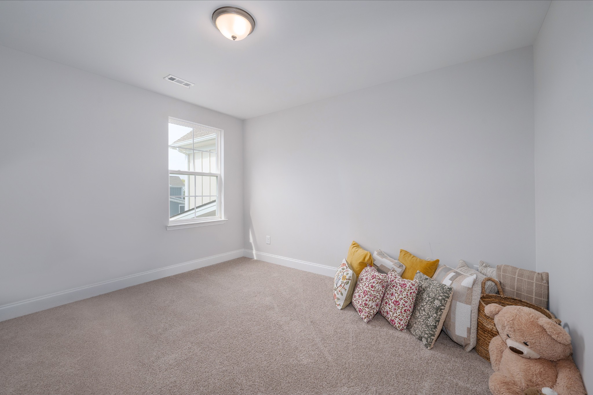 1060 June Wilde Ridge Spring Hill, TN 37174 - Photo 21 of 43 a bed room with a bed and a window