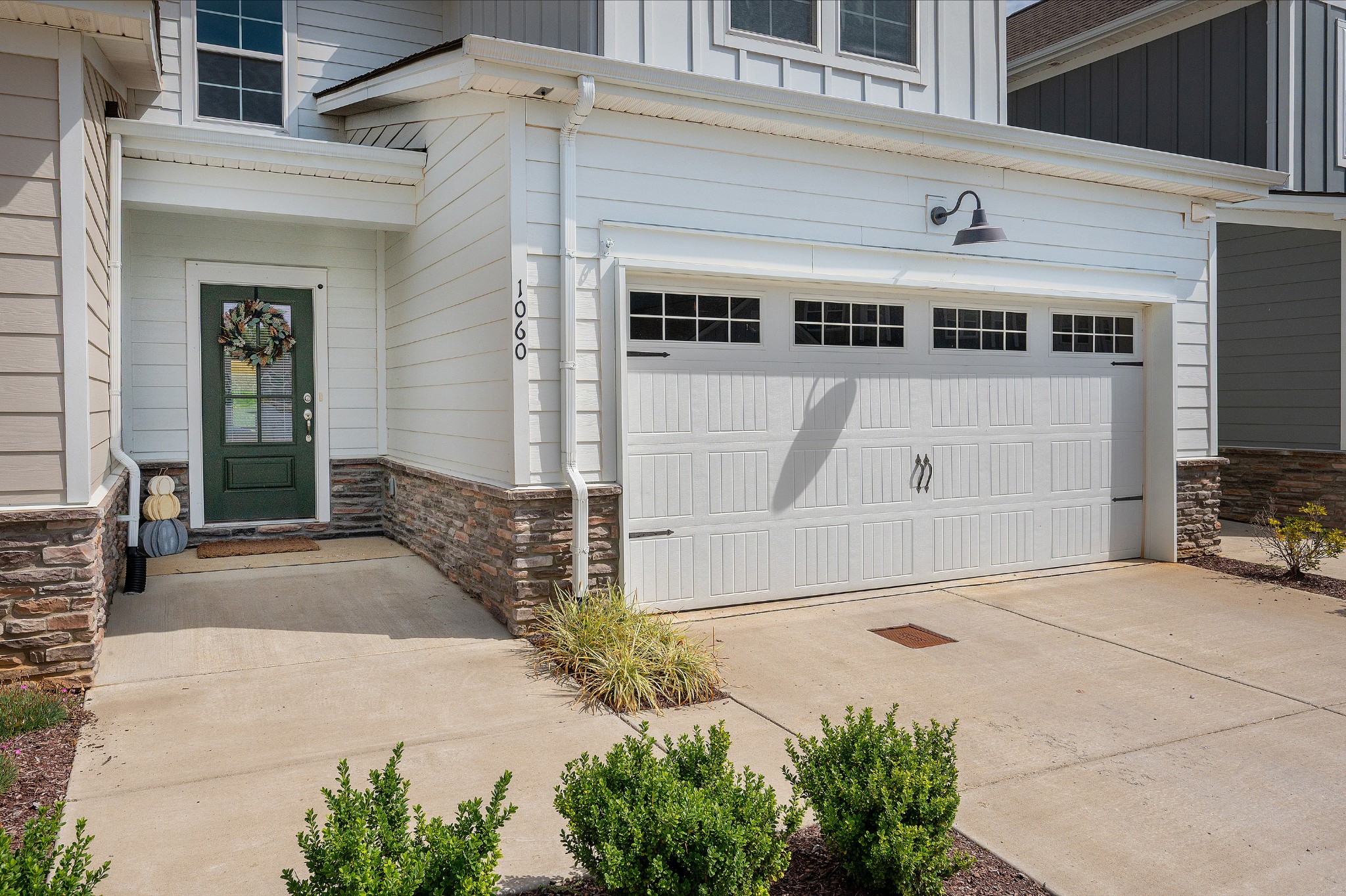 1060 June Wilde Ridge Spring Hill, TN 37174 - Photo 29 of 43 a front view of a house with a yard