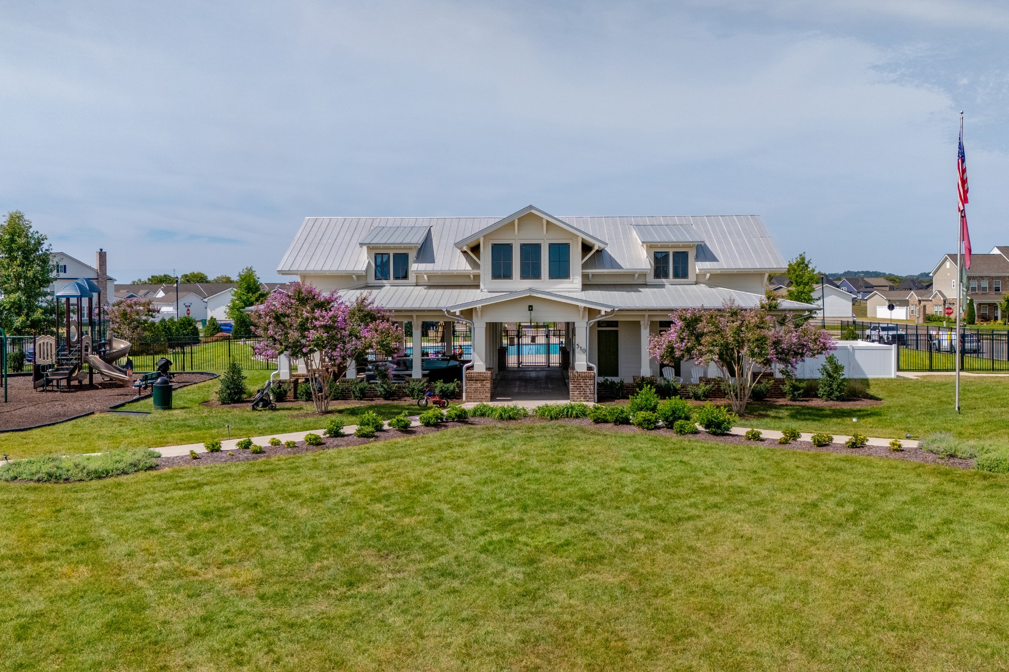 1060 June Wilde Ridge Spring Hill, TN 37174 - Photo 38 of 43 a front view of a house with garden