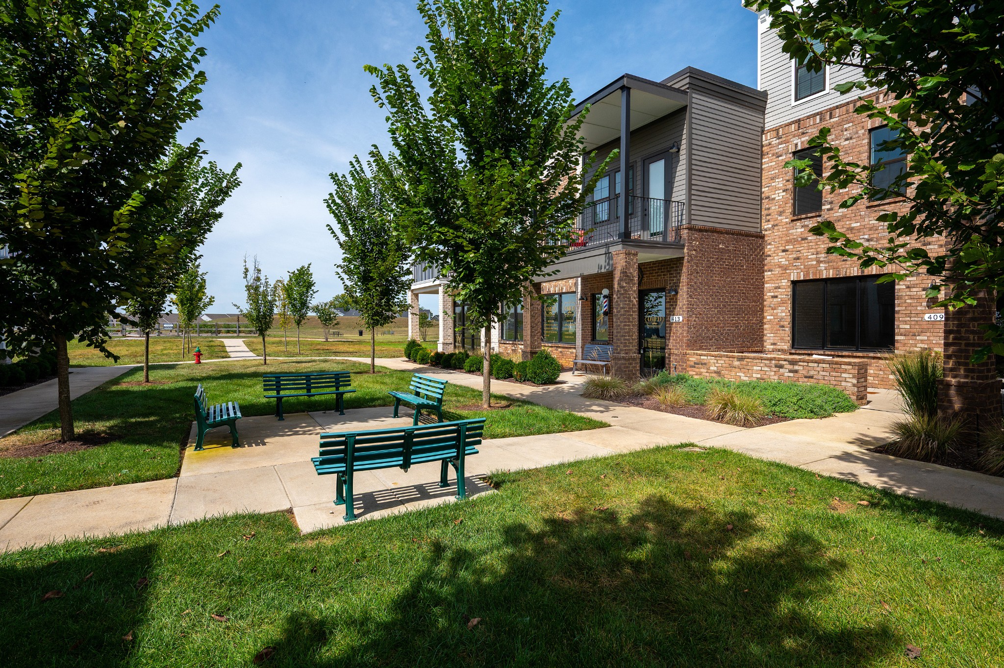 1060 June Wilde Ridge Spring Hill, TN 37174 - Photo 41 of 43 a view of backyard with a garden and outdoor seating