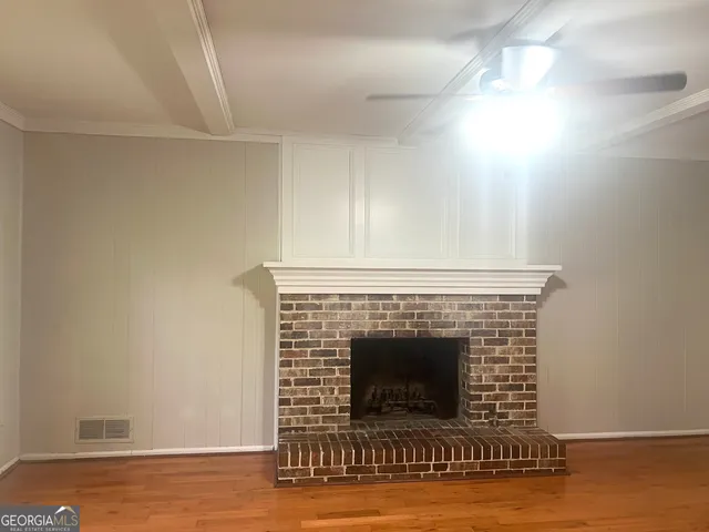 a living room with a fireplace