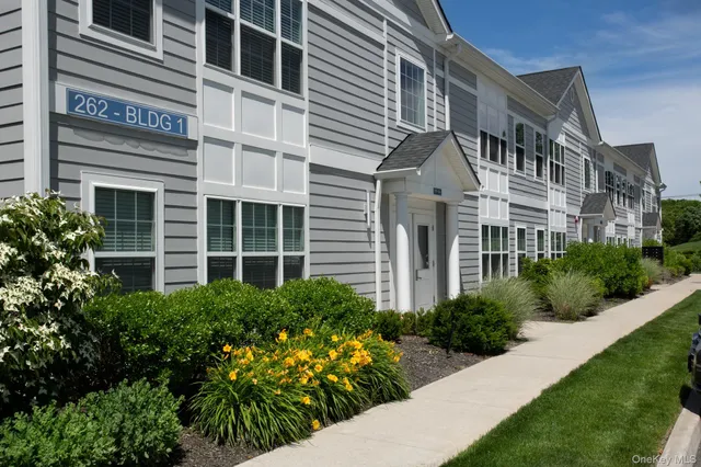 a front view of a multi story residential apartment building