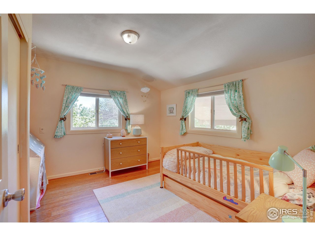 5196 Oxford Road Longmont, CO 80503 - Photo 27 of 38 a view of an empty room with a window