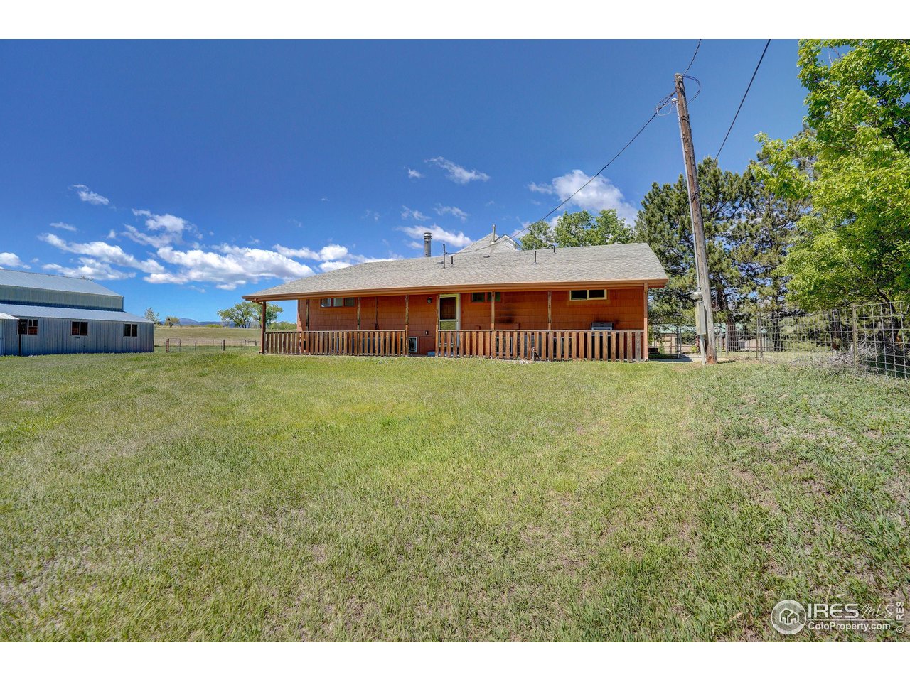 5196 Oxford Road Longmont, CO 80503 - Photo 32 of 38 a view of a house with a big yard