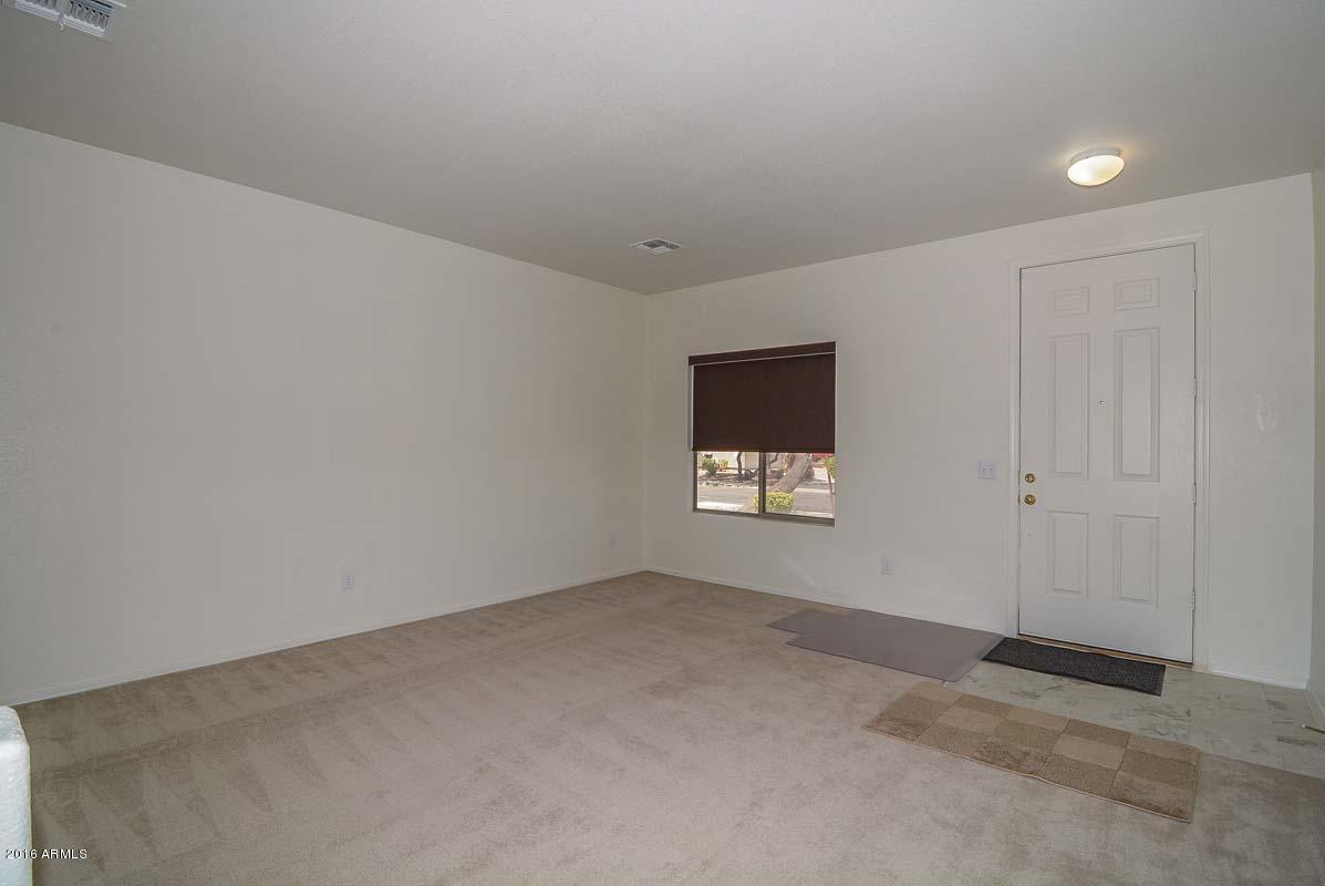 9427 West Eaton Road Phoenix, AZ 85037 - Photo 3 of 35 Living Room2