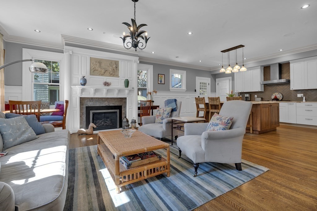 23 Eliot Street, Unit 1 Boston, MA 02130 - Photo 13 of 39 a living room with furniture and a fireplace