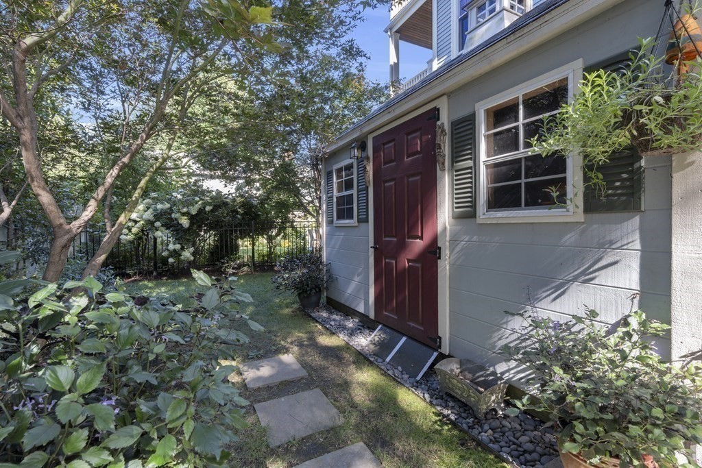 23 Eliot Street, Unit 1 Boston, MA 02130 - Photo 18 of 39 a view of a house with a yard