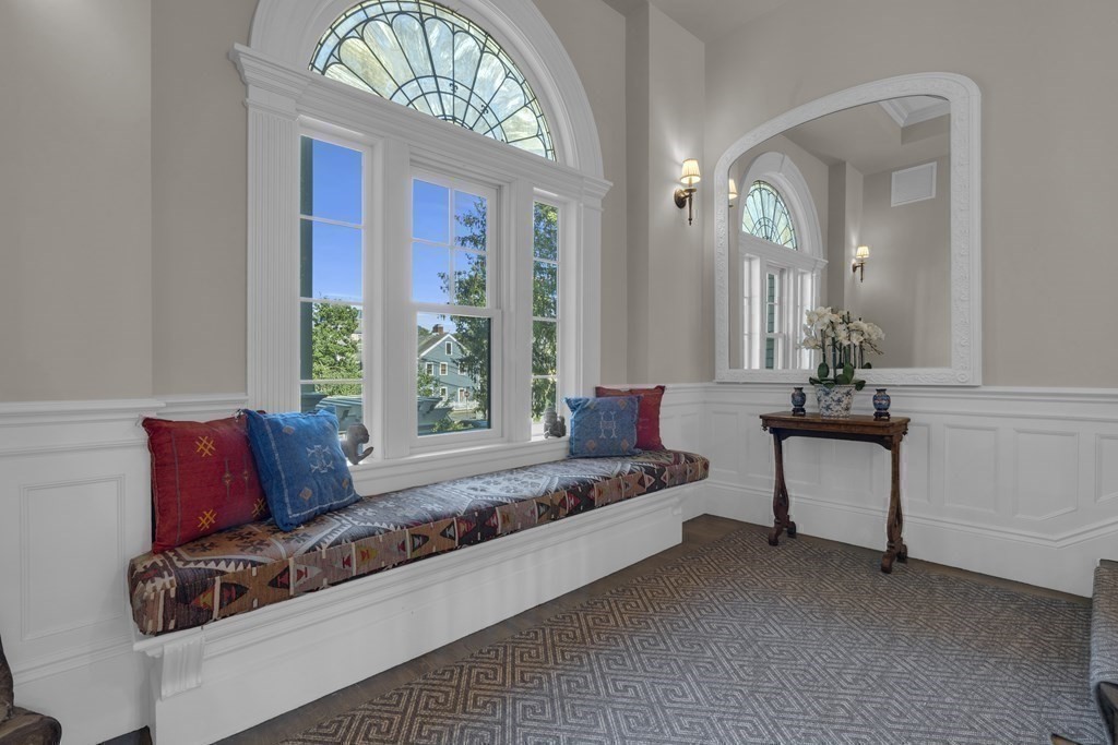 23 Eliot Street, Unit 1 Boston, MA 02130 - Photo 20 of 39 a living room with furniture and a large window