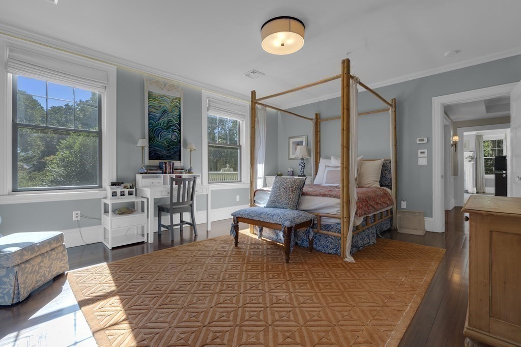 23 Eliot Street, Unit 1 Boston, MA 02130 - Photo 26 of 39 a living room with furniture and a window