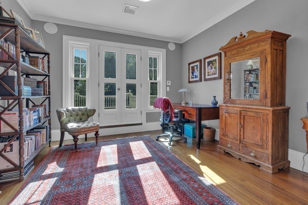 23 Eliot Street, Unit 1 Boston, MA 02130 - Photo 27 of 39 a living room with furniture and a potted plant