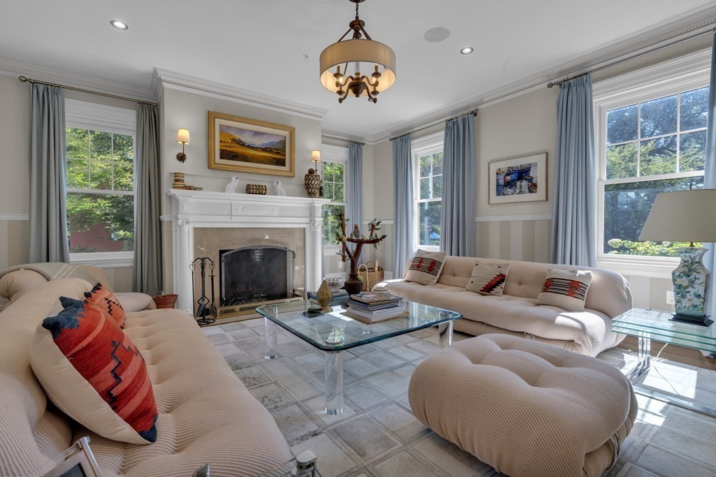 23 Eliot Street, Unit 1 Boston, MA 02130 - Photo 3 of 39 a living room with furniture fireplace and window
