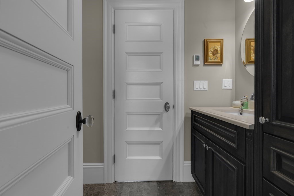 23 Eliot Street, Unit 1 Boston, MA 02130 - Photo 32 of 39 a bathroom with a shower and a sink
