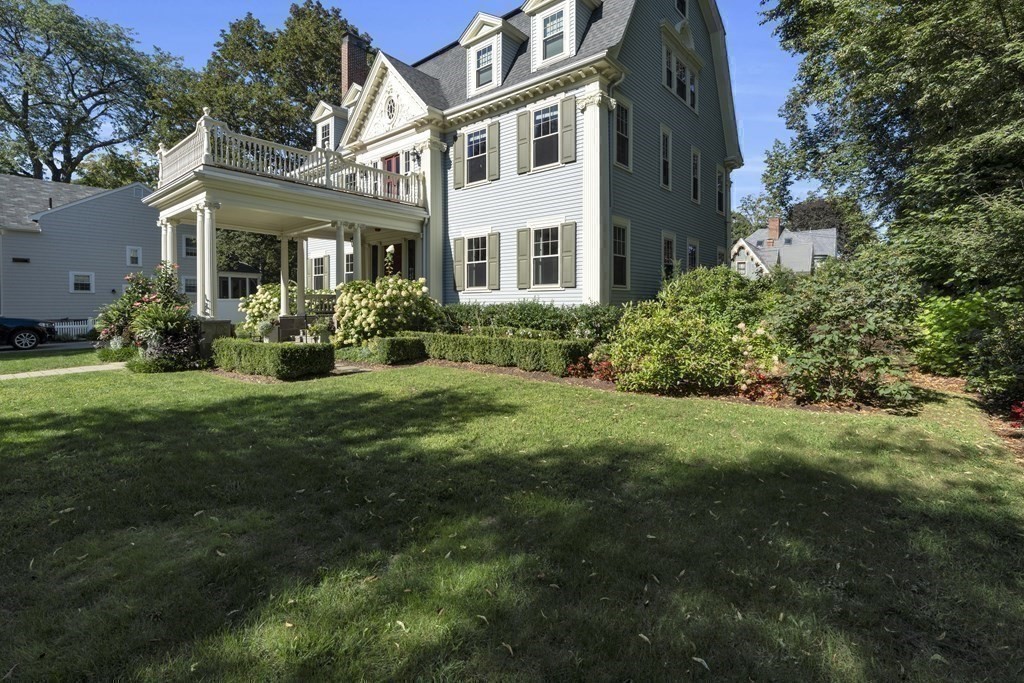 23 Eliot Street, Unit 1 Boston, MA 02130 - Photo 37 of 39 a view of a house with a garden and plants
