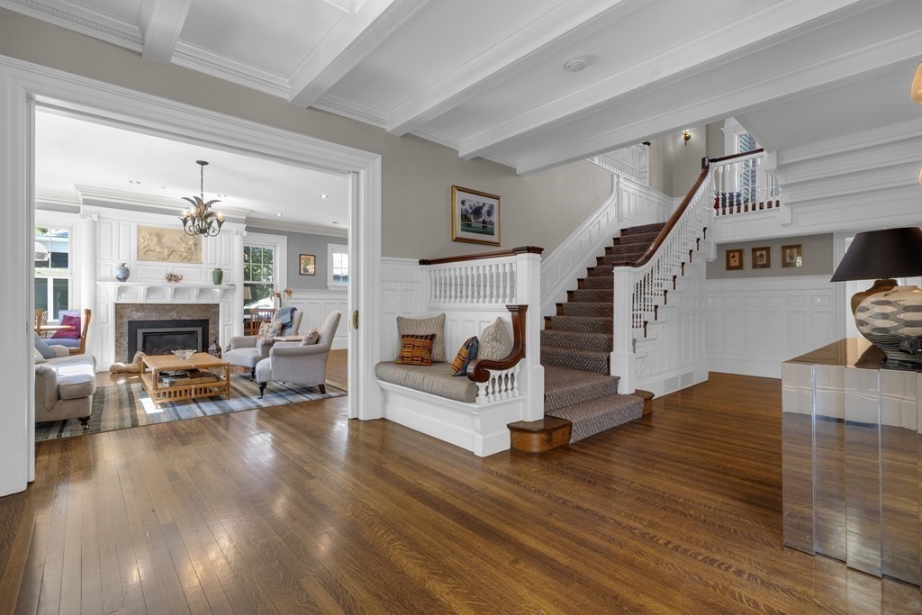 23 Eliot Street, Unit 1 Boston, MA 02130 - Photo 9 of 39 a living room with furniture and a fireplace