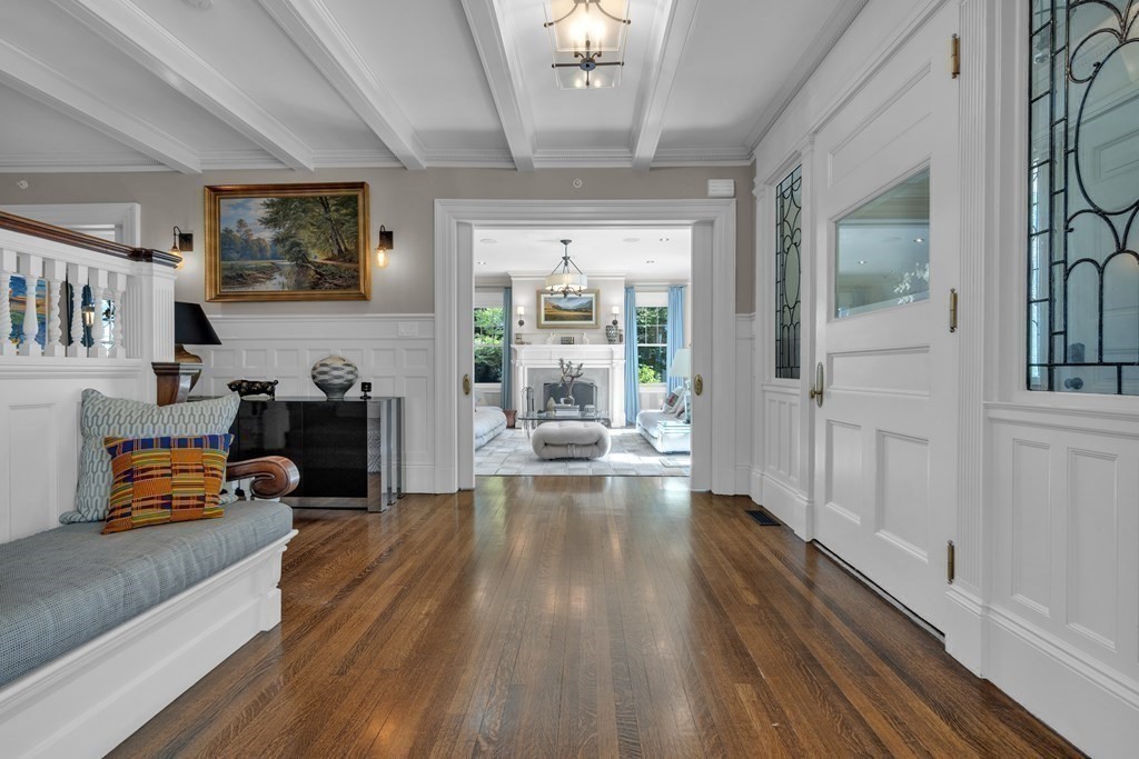 23 Eliot Street, Unit 1 Boston, MA 02130 - Photo 10 of 39 a living room with furniture and a fireplace