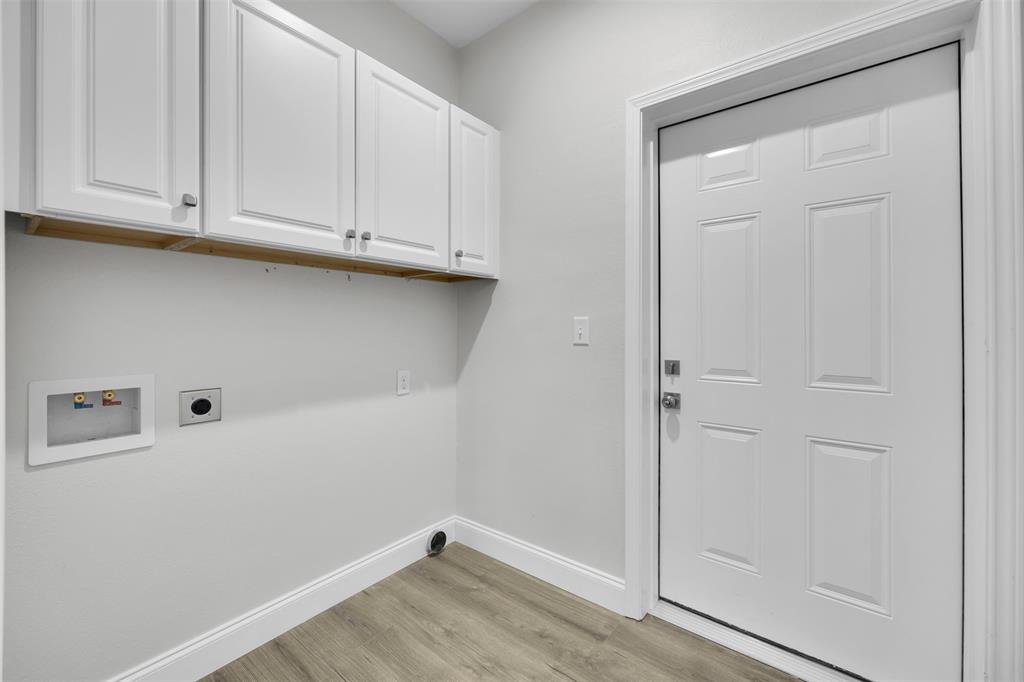 407 Dallas Street Rice, TX 75155 - Photo 22 of 25 a view of cabinets