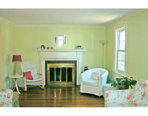 86 Risley Road Brookline, MA 02467 - Photo 3 of 5 a living room with furniture and a fireplace