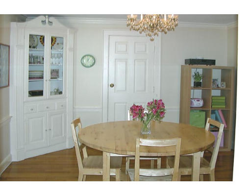 86 Risley Road Brookline, MA 02467 - Photo 4 of 5 a dining room with furniture and wooden floor