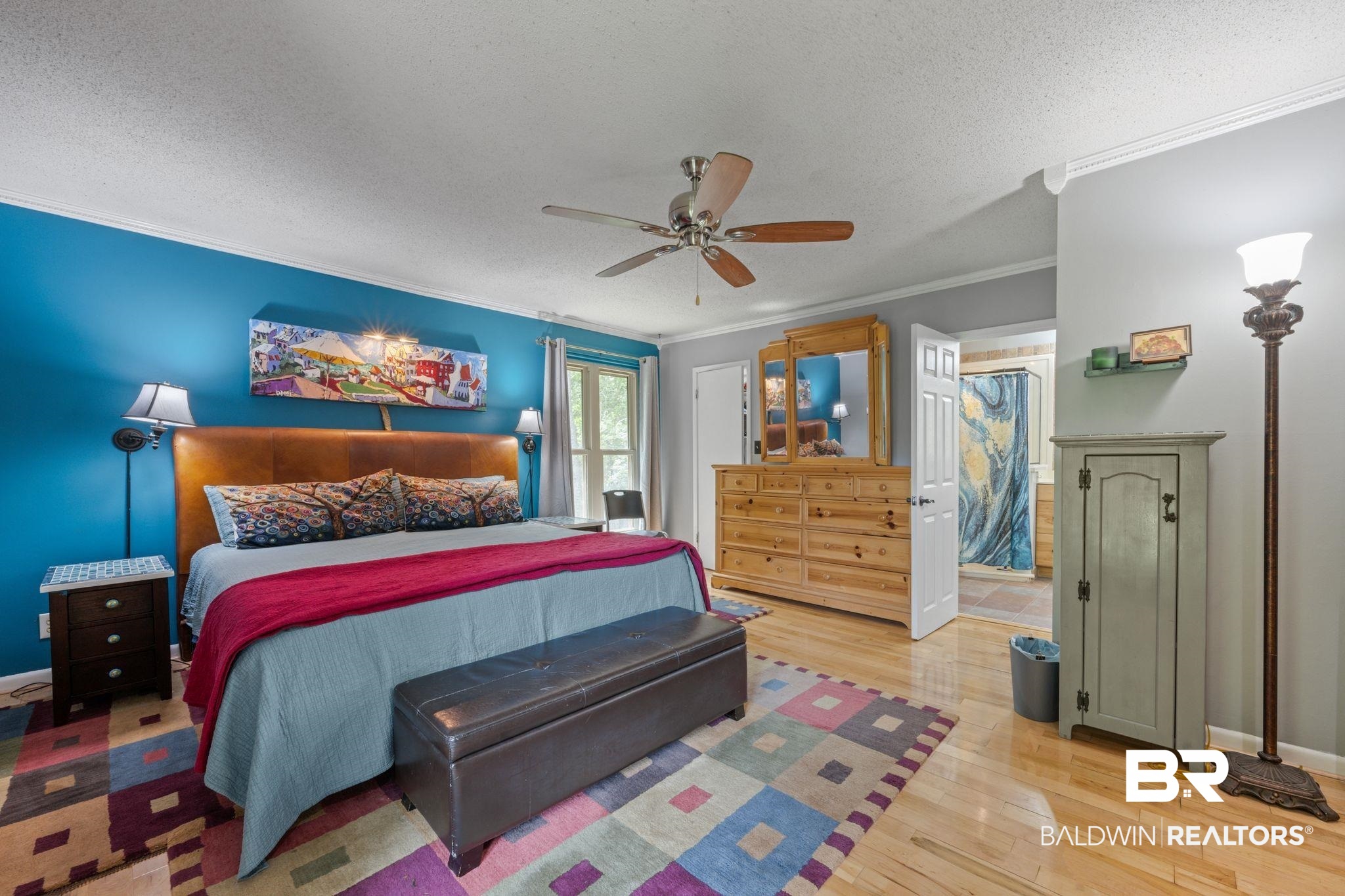 40 Caisson Trace Daphne, AL 36527 - Photo 25 of 54 Bedroom featuring a ceiling fan, hardwood / wood-style floors, and crown molding