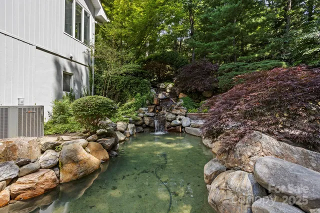a backyard of a house with lots of green space