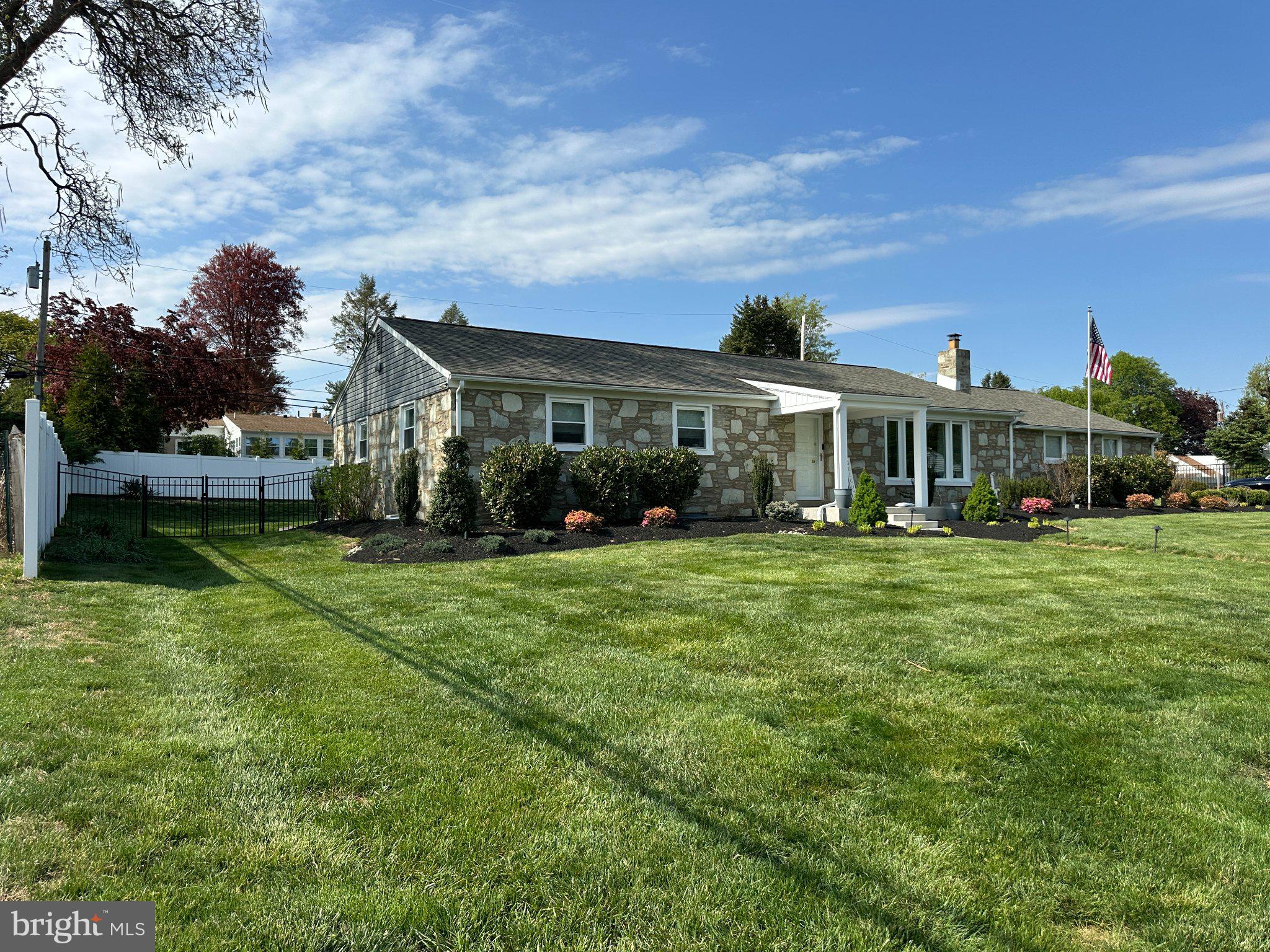 3936 Martin Road Huntingdon Valley, PA 19006 - Photo 67 of 75 Charming stone home with lush lawn.