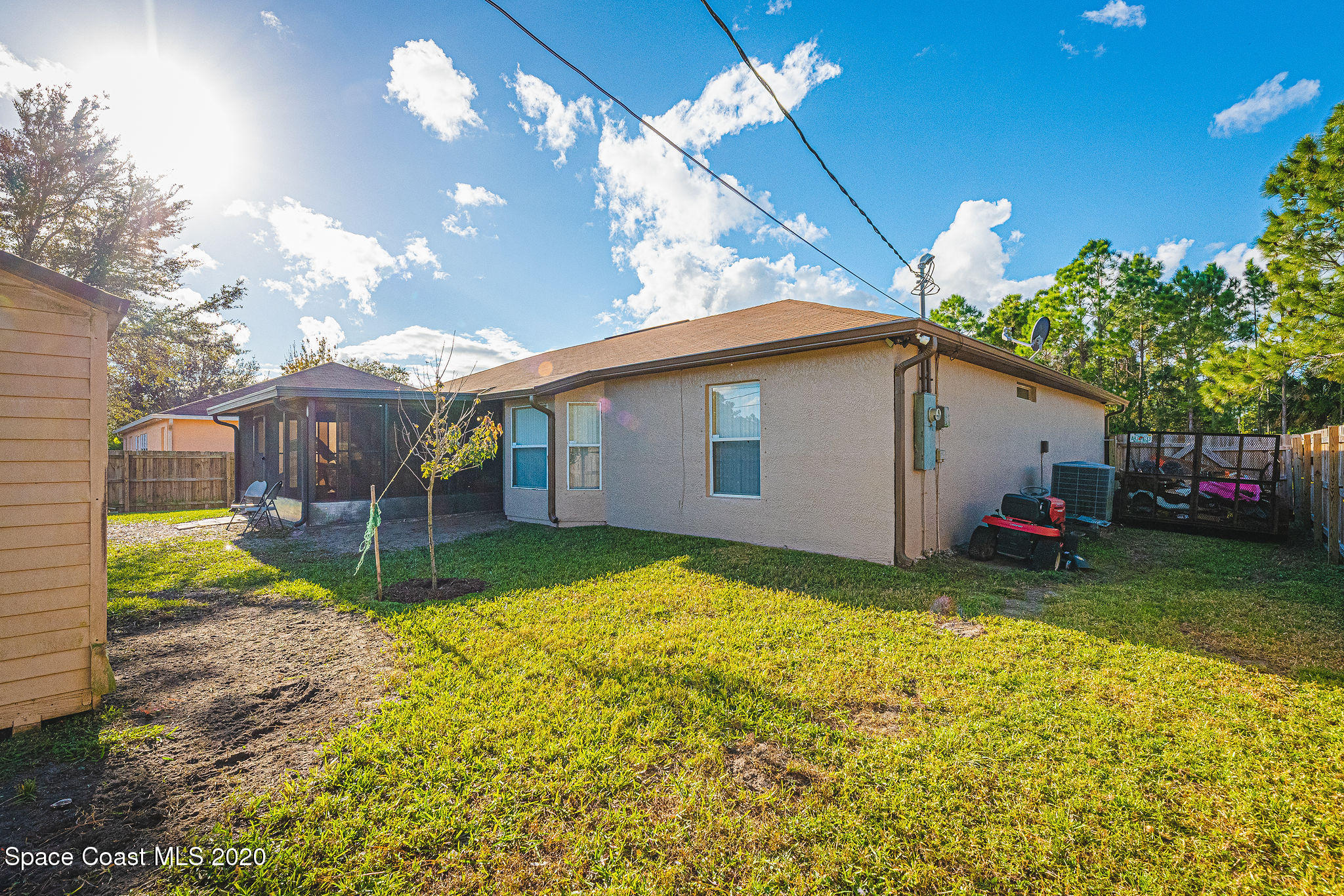1240 Rabbit Street Southeast Palm Bay, FL 32909 - Photo 26 of 41 a view of a house with backyard