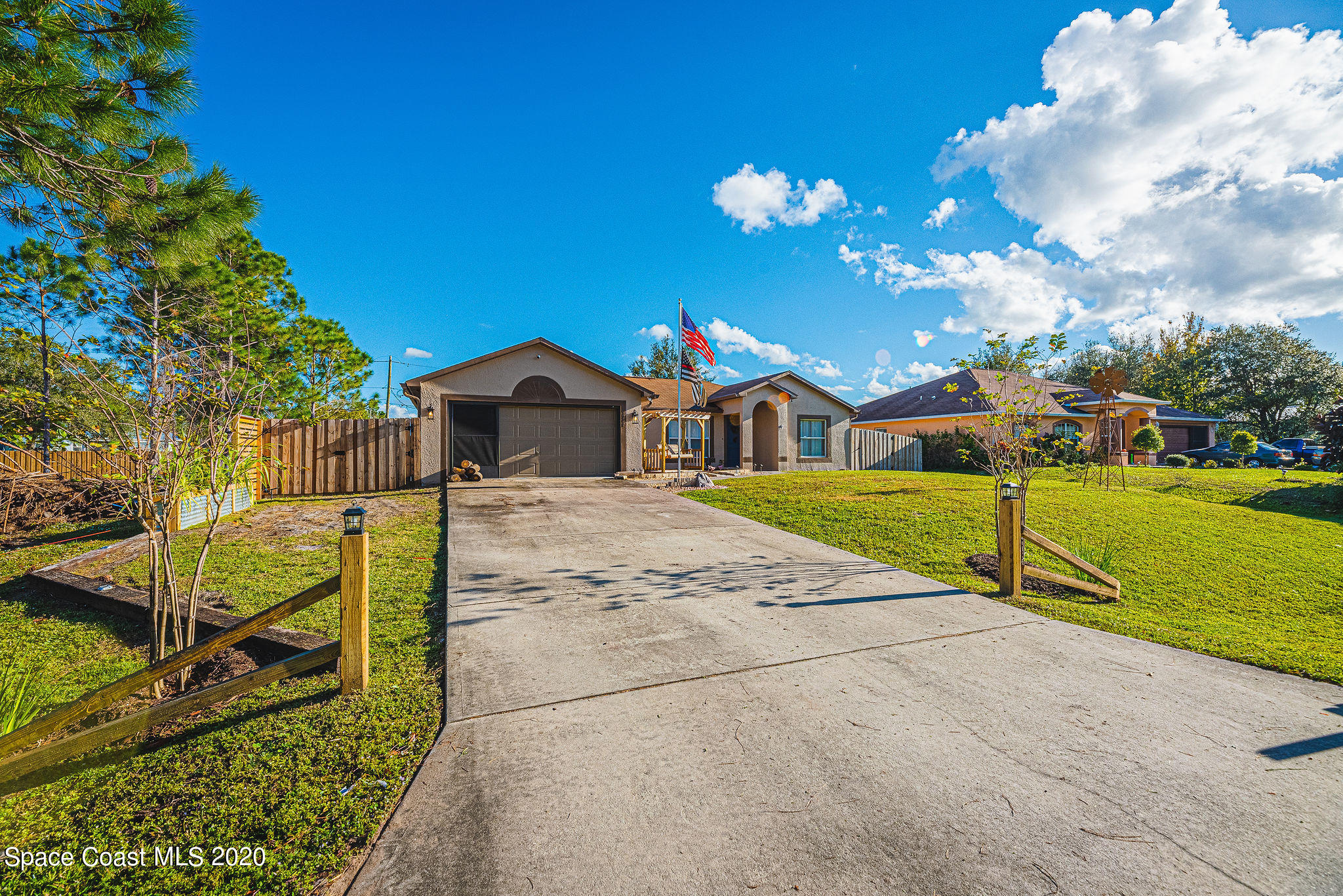 1240 Rabbit Street Southeast Palm Bay, FL 32909 - Photo 27 of 41 a view of house with outdoor space and street view