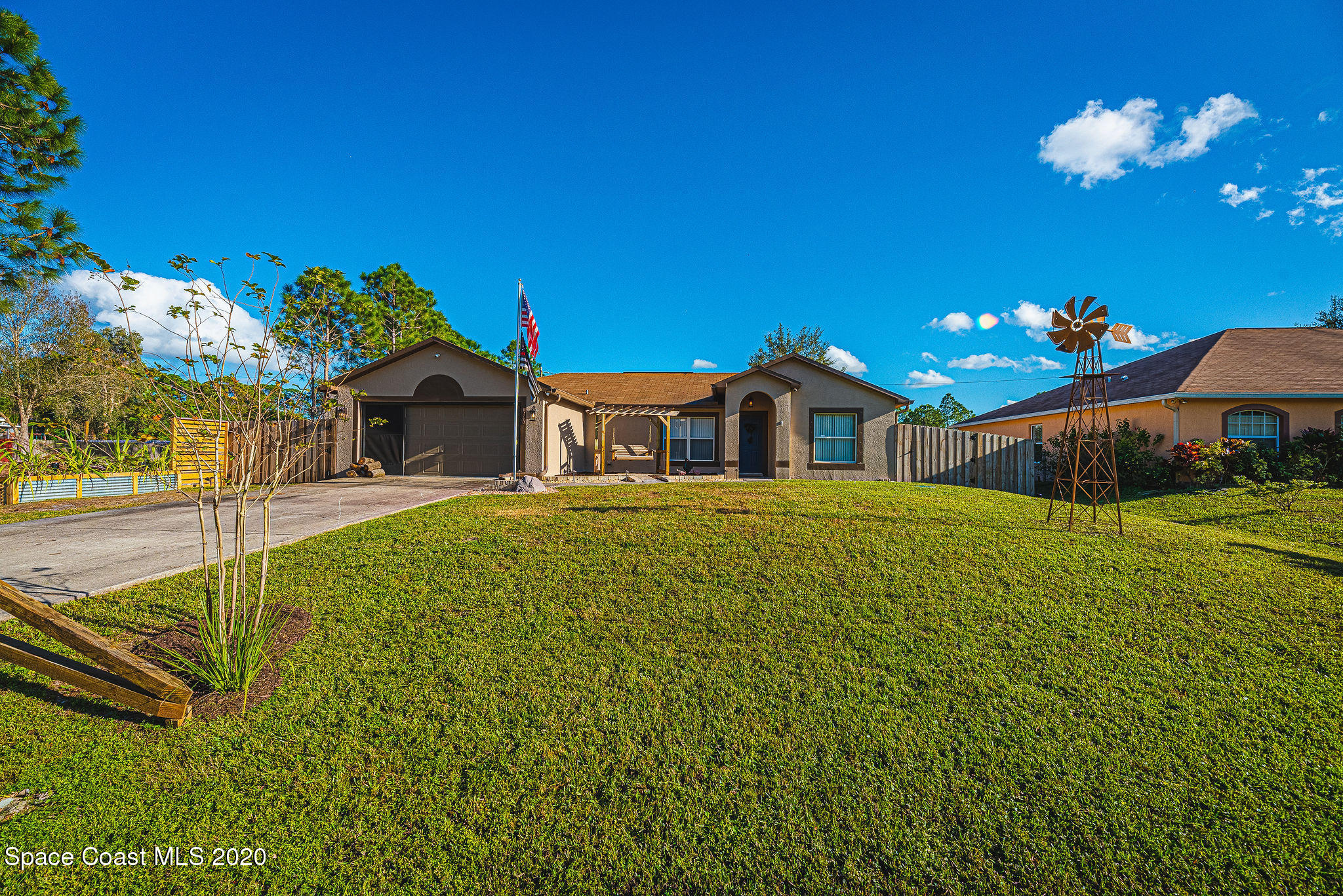 1240 Rabbit Street Southeast Palm Bay, FL 32909 - Photo 28 of 41 a house view with a swimming pool