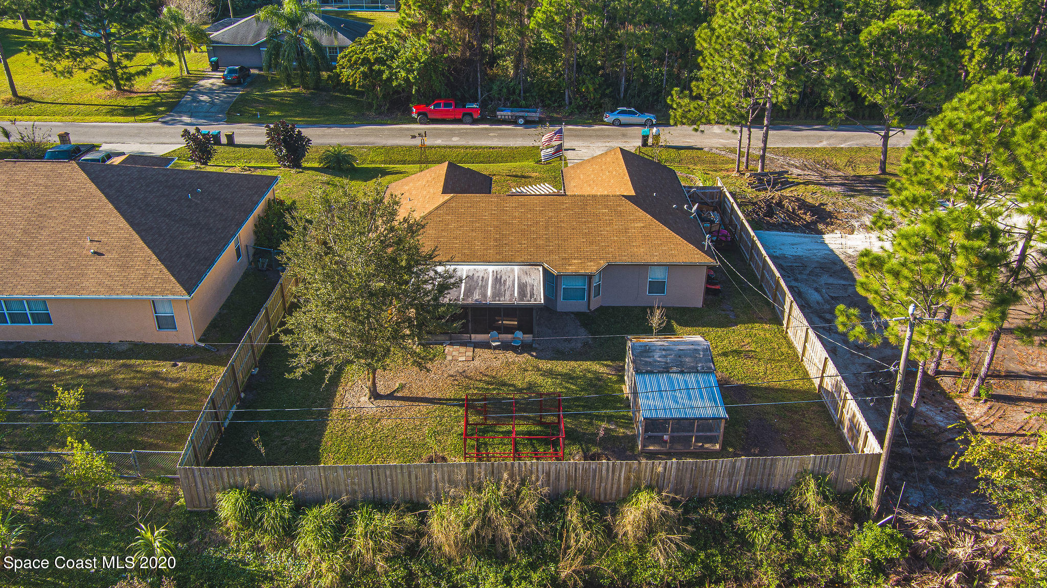1240 Rabbit Street Southeast Palm Bay, FL 32909 - Photo 39 of 41 a view of swimming pool with outdoor seating and yard