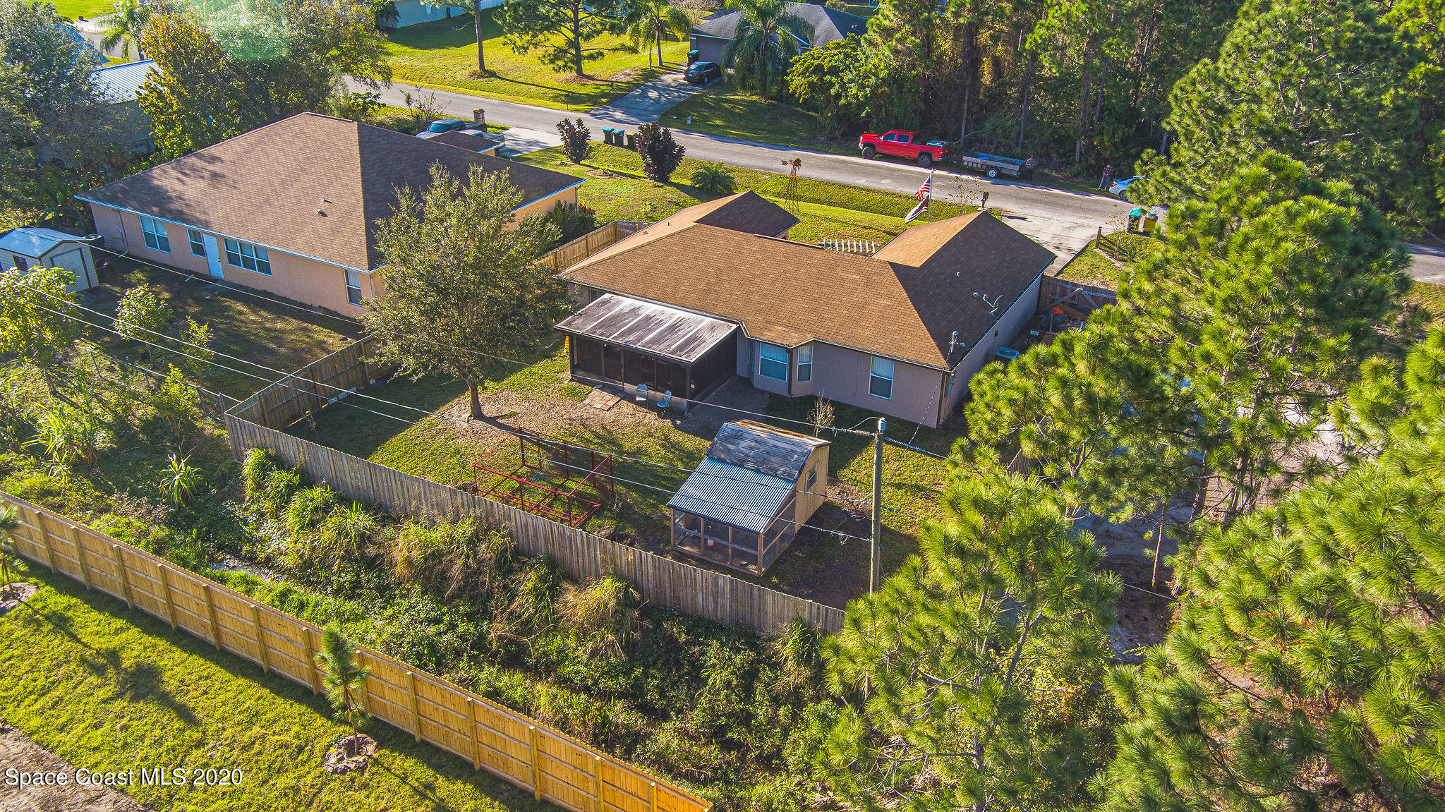1240 Rabbit Street Southeast Palm Bay, FL 32909 - Photo 40 of 41 an aerial view of a house with a garden