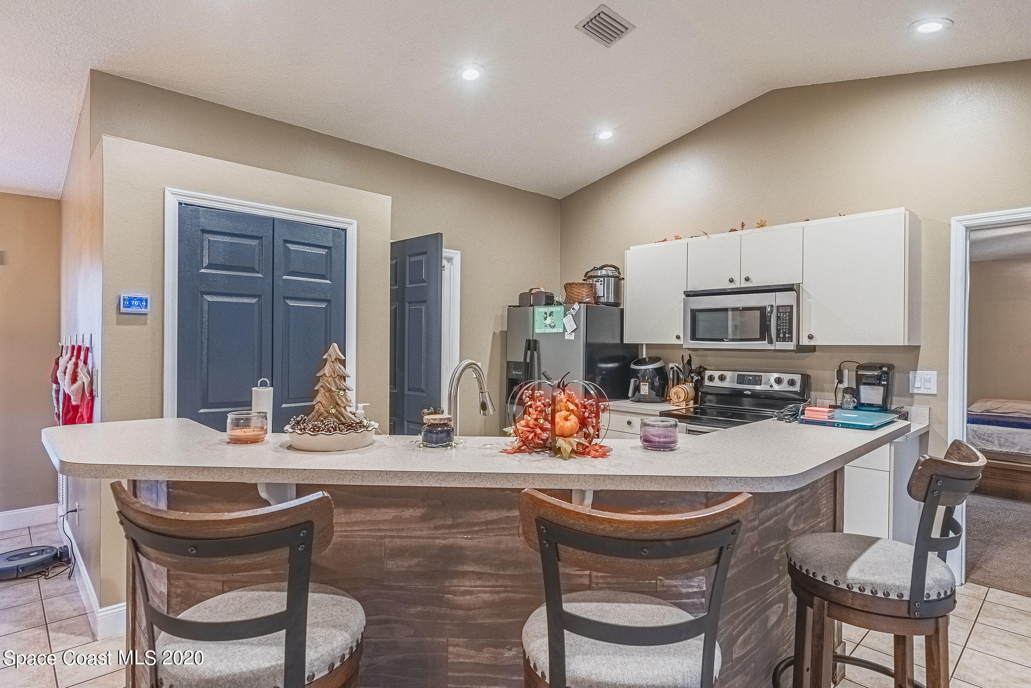 1240 Rabbit Street Southeast Palm Bay, FL 32909 - Photo 6 of 41 a dining room with furniture and window