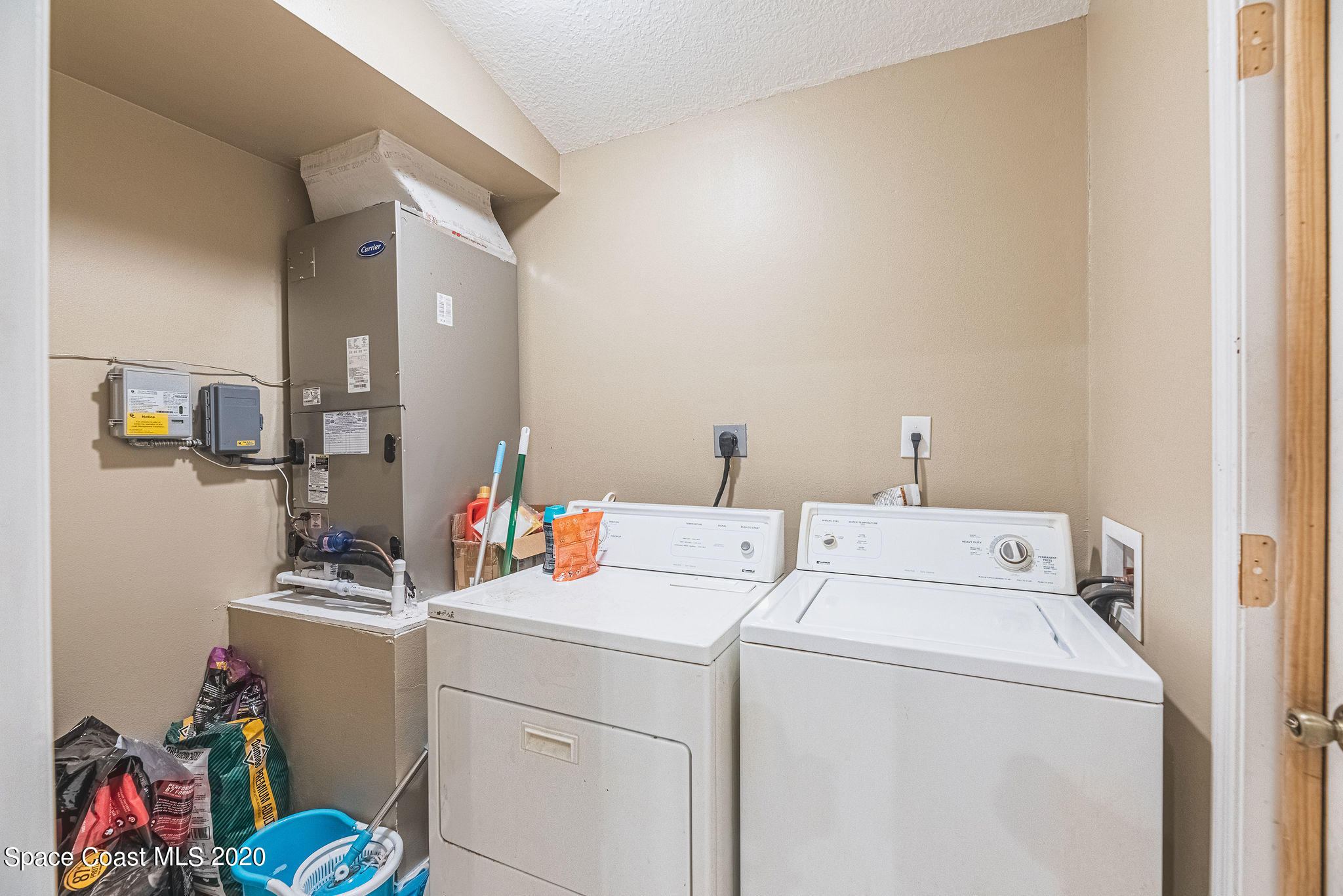 1240 Rabbit Street Southeast Palm Bay, FL 32909 - Photo 10 of 41 a room with storage and utility