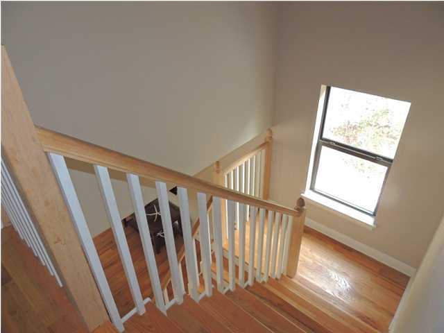 199 Walnut Street Santa Rosa Beach, FL 32459 - Photo 11 of 35 a view of staircase with wooden floor and white walls