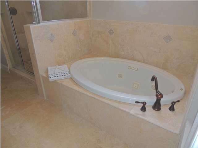199 Walnut Street Santa Rosa Beach, FL 32459 - Photo 17 of 35 a bathroom with a tub