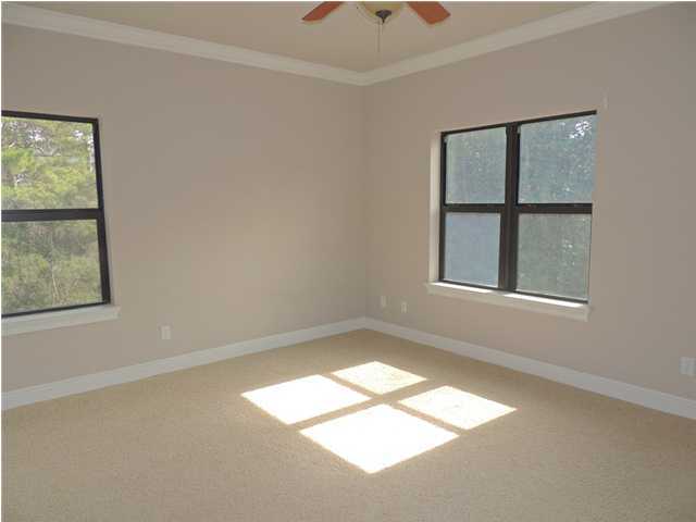 199 Walnut Street Santa Rosa Beach, FL 32459 - Photo 26 of 35 an empty room with windows