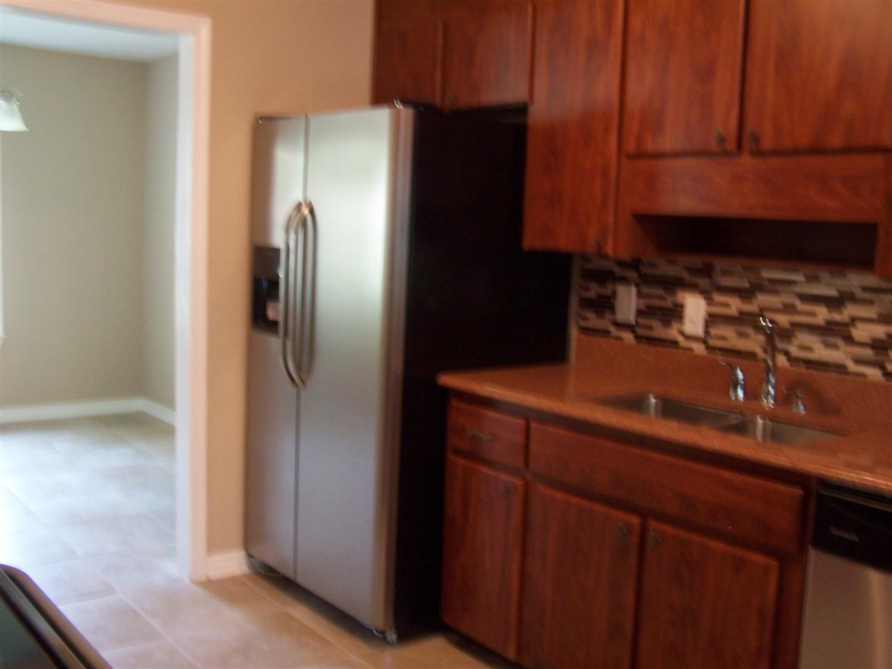 8329 Pilgrim Road Pensacola, FL 32514 - Photo 7 of 38 Wood finish on cabinets is so rich!