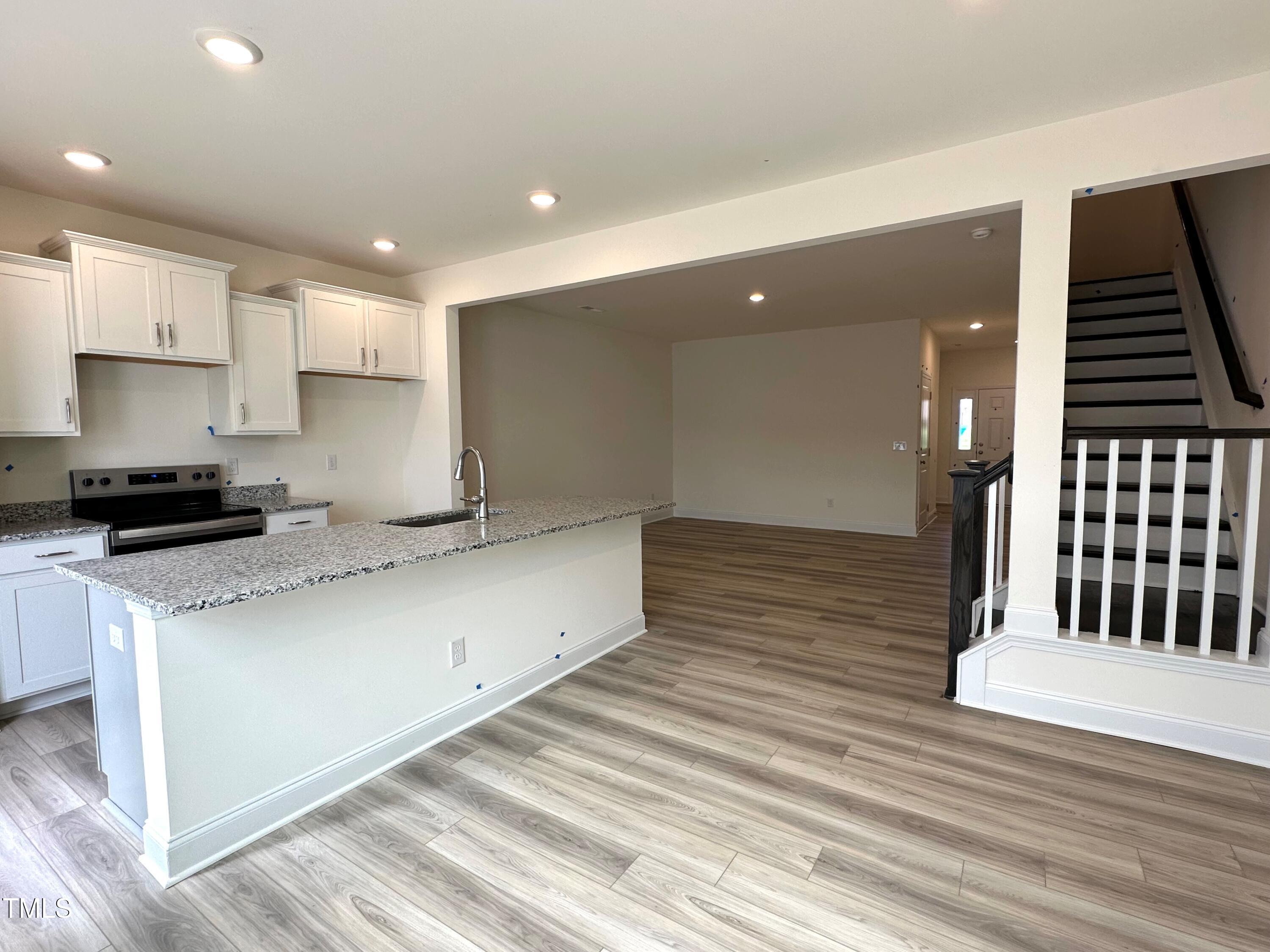 877 Channel Drop Loop Zebulon, NC 27597 - Photo 4 of 26 Breakfast Kitchen Living