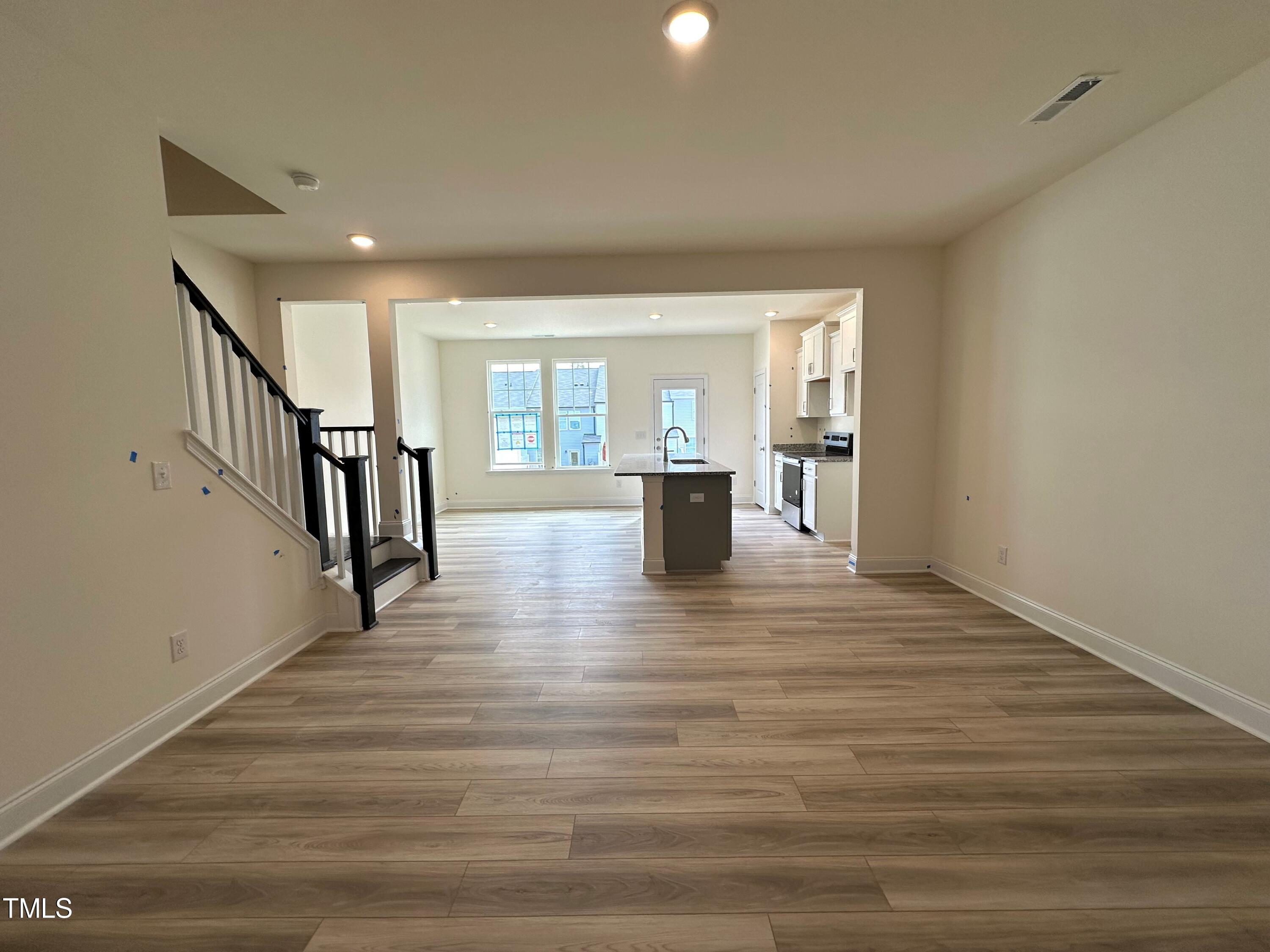 877 Channel Drop Loop Zebulon, NC 27597 - Photo 9 of 26 Living Kitchen