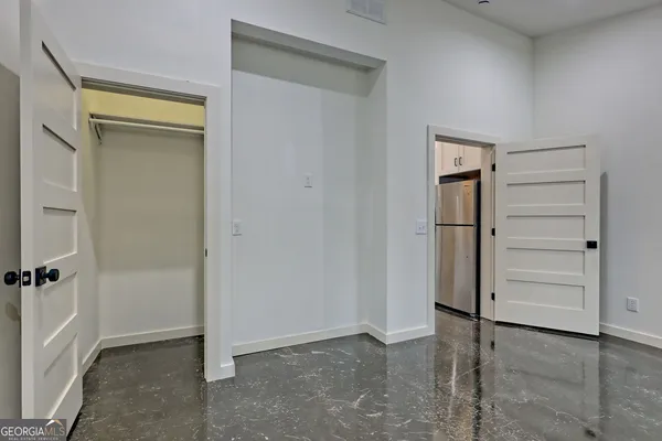 a kitchen with a stove and a microwave