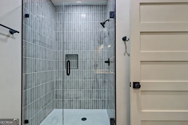 a kitchen with stainless steel appliances a refrigerator sink and cabinets