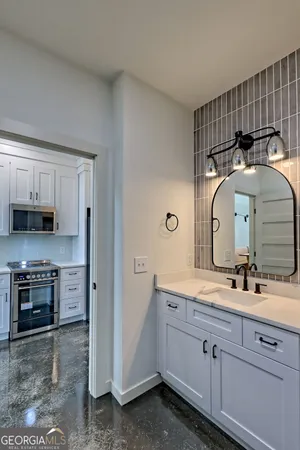 a bedroom with a bed and a table