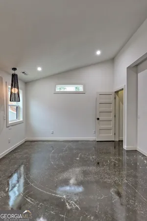 a city street lined with buildings and cars