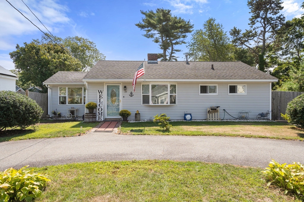 a view of house with outdoor space and swimming pool