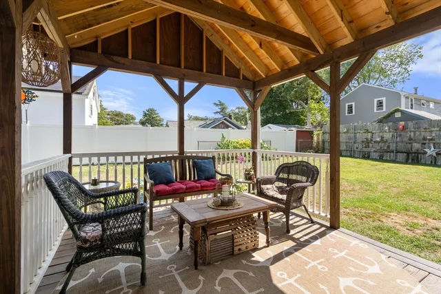 a view of a chairs and table in the patio