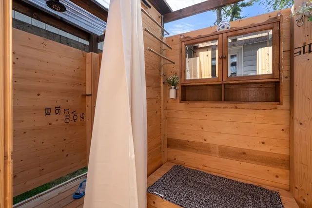 a view of a wooden door of the house